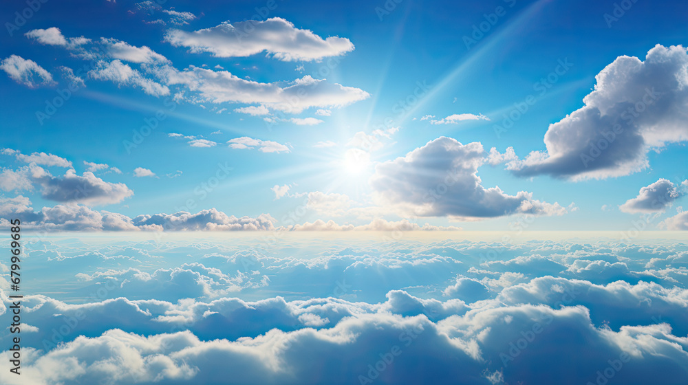 blue sky with clouds and sun, Sun light shining brightly on blue sky above thick layer of white fluffy clouds ,