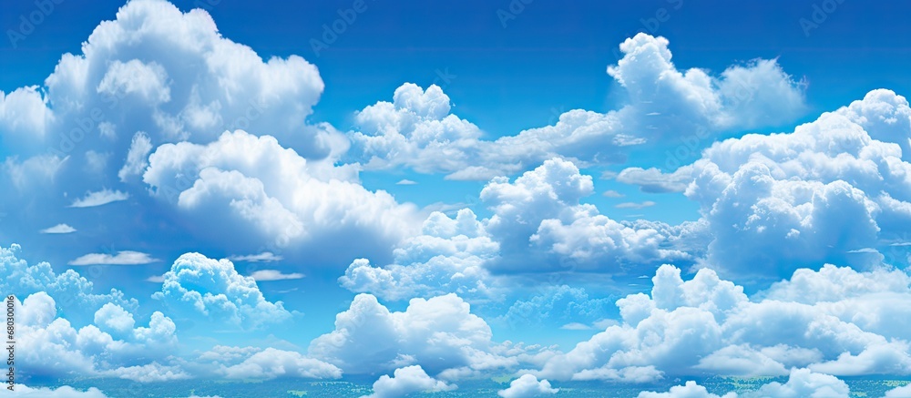 As the summer sky brims with vibrant blue, fluffy clouds take formation, creating a mesmerizing pattern air that evokes a sense of respect and honor for the beauty of nature. Its a concept that one